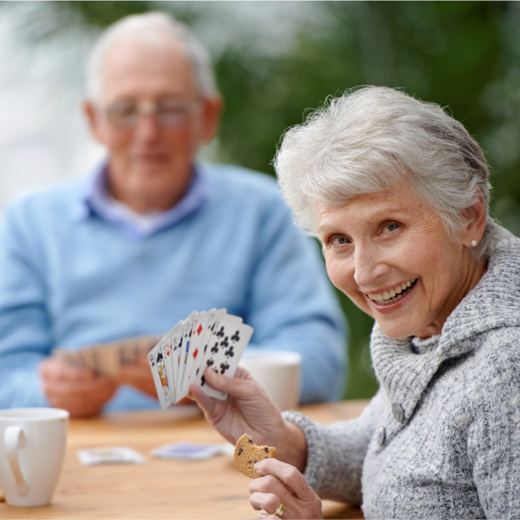 Seniors Playing Cards at Arbor Court Lawrence - Independant Living & Retirement Apartments